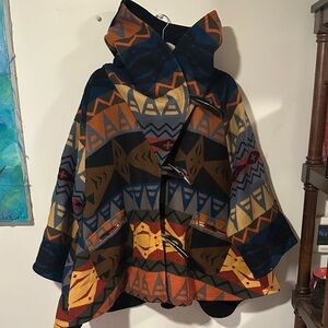 This is a Pendleton wool blend poncho coat with a Southwestern pattern
